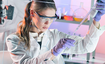 picture of researcher filling a testube