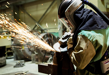 A 3M user grinds with a 3M abrasive product