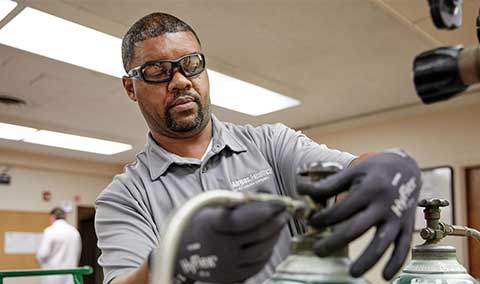 An Airgas Total Gas Management Services technician installing Medical Gas.