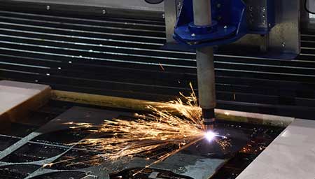 Close up of plasma cutting operation.