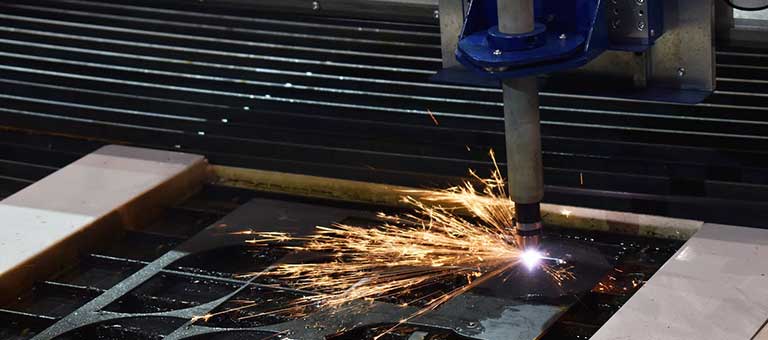 Close up of plasma cutting operation.