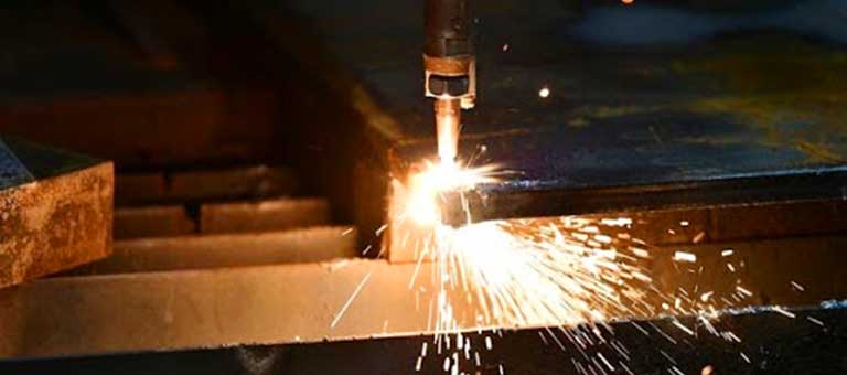 Cutting torch cutting steel beams