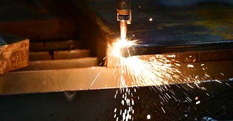 Close up of plasma cutting operation.