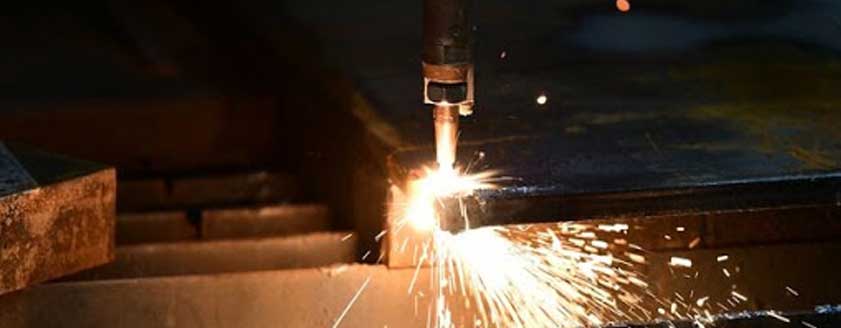 Cutting torch cutting steel beams