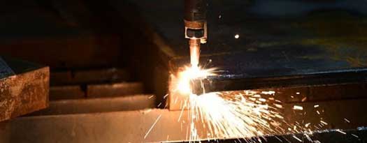 Cutting torch cutting steel beams