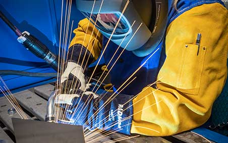A woman TIG welding
