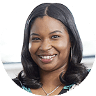Natasha, Airgas Talent Representative, seated at her desk smiling.