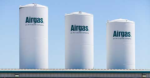 Several on-site bulk tanks, part of an Airgas air separation unit, are an example of the Airgas' multiple supply modes for gases via a robust supply chain and large US footprint.