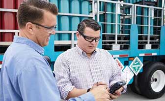 A gas delivery tuck cruzing down an empty highway