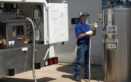 An external MicroBulk cylinder being filled from a supply truck