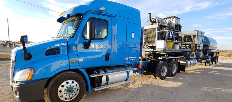 Airgas pumping truck in forced perspective