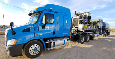 Airgas pumping truck in forced perspective