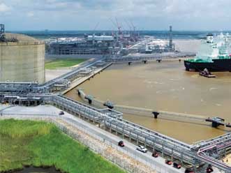 A bird's eye view of a LNG port on a river