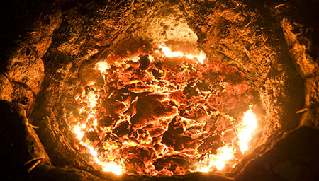 Bird's eye view of molten metal in a pot