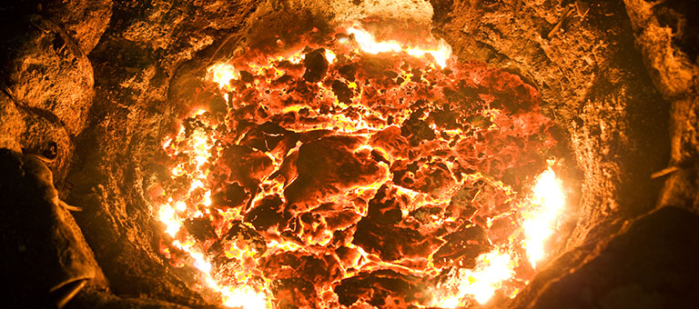 Bird's eye view of molten metal in a pot