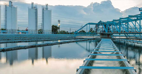 Lakeside view of water storage area at a water processing plant