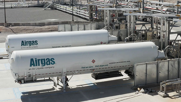 Tanker trucks being filled with hydrogen gas