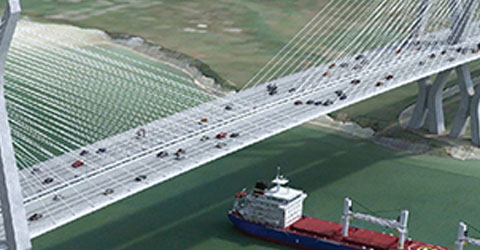 An image of a suspension bridge with a tanker sailing beneath