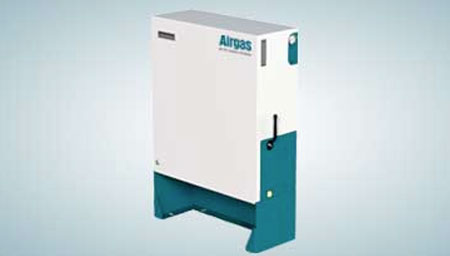 A technician flips the on/off switch on a SMARTOP Cylinder in a laboratory.