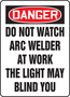 Accuform Signs® 14" X 10" Black/Red/White Adhesive Dura-Vinyl™ Safety Sign "DANGER DO NOT WATCH ARC WELDER AT WORK THE LIGHT MAY BLIND YOU"